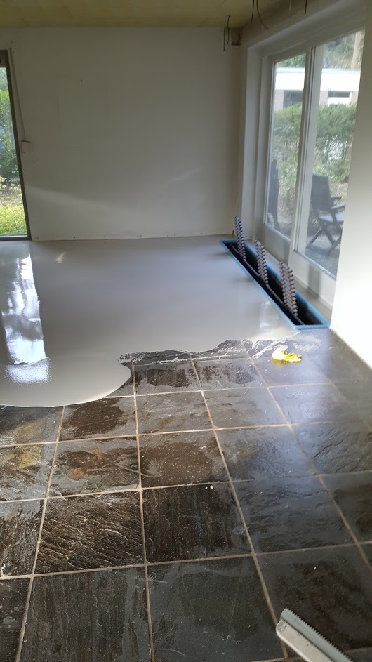 Egaliseren van plavuizen